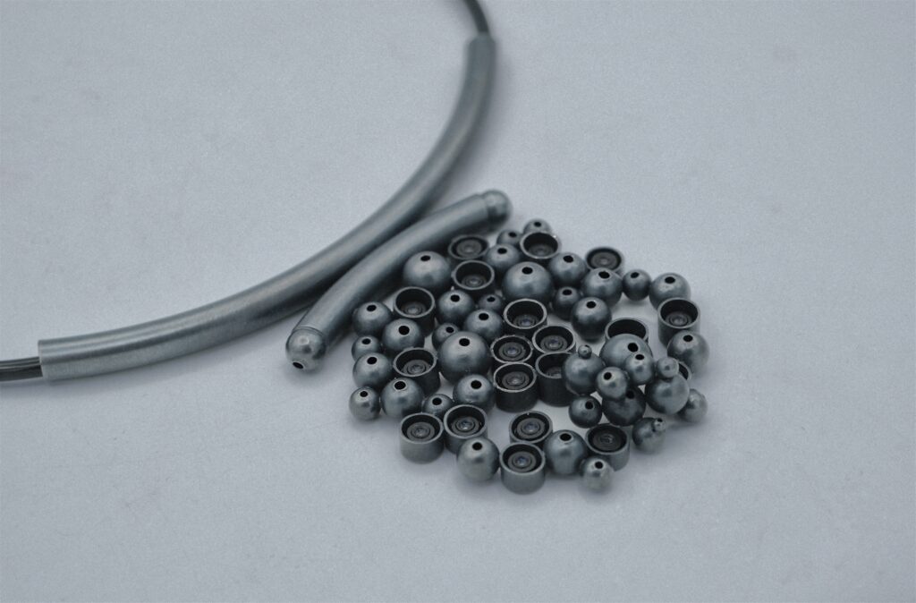 Another piece from the 'Tense' series — a necklace. It continues to use repetitive elements as a visual language to express the feeling of being stared at.