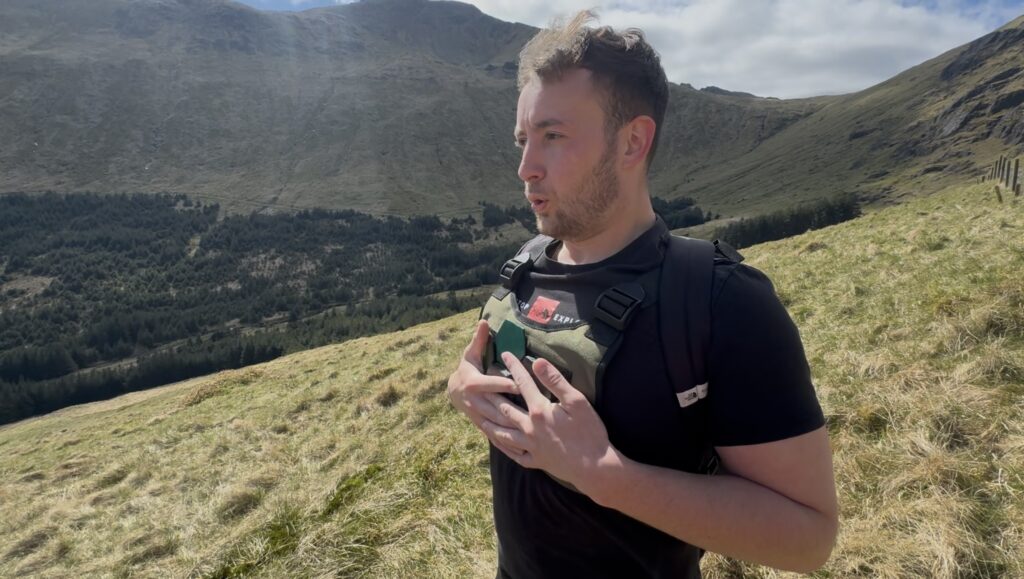 Hill walker experiencing the vibrations from the vest