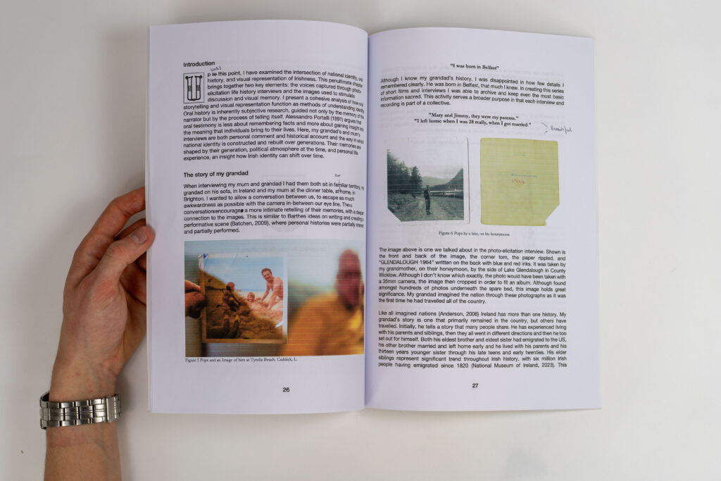 Open document showing pages discussing a grandfather’s oral history and personal photos annotated with handwriting.
