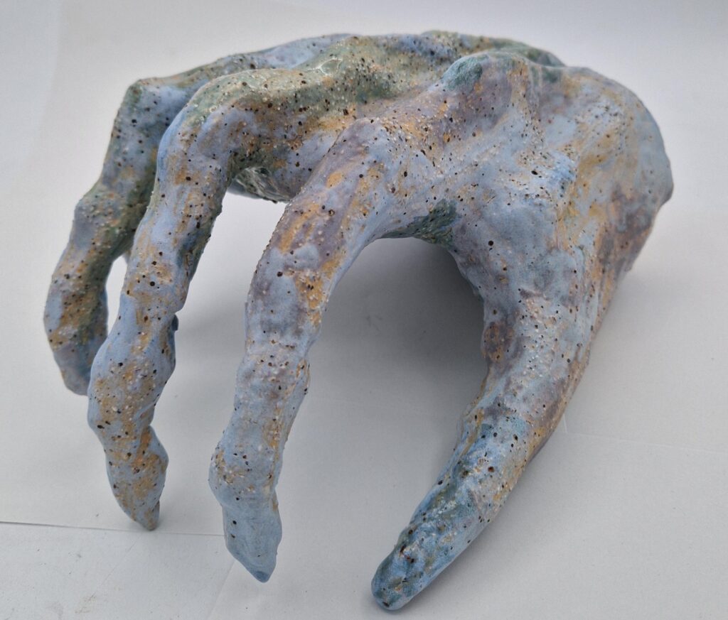 original ceramic hands where too heavy for sculpture