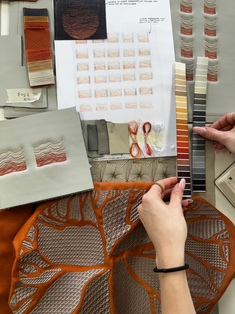Design development process shown from initial sketches to digital design and trial samples, exploring thread qualities and stitch types to achieve the desired aesthetic and performance in automotive textiles.